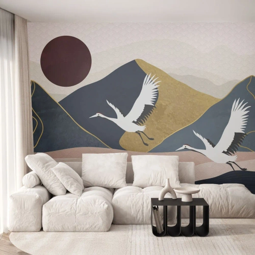 Fototapeta Premium Sand - Stylizowane żurawie na tle gór i czerwonego słońca - 100x70cm - I znowu ZLECIAŁ dzień - Nowoczesna dekoracja ścienna do salonu, kuchni i sypialni ARTTOR