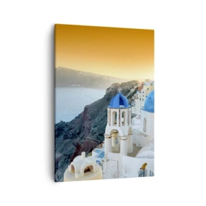 Obraz na płótnie - Widok na wioskę w Grecji z niebieskimi kopułami i morzem - 50x70cm - Santorini - przytulone do skał - Nowoczesna dekoracja ścienna do salonu, kuchni i sypialni ARTTOR