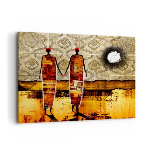 Obraz na płótnie - Abstrakcyjna para postaci na tle złotych wzorów i krajobrazu - 100x70cm - Kompozycja etniczna w kolorach Afryki - Nowoczesna dekoracja ścienna do salonu, kuchni i sypialni ARTTOR