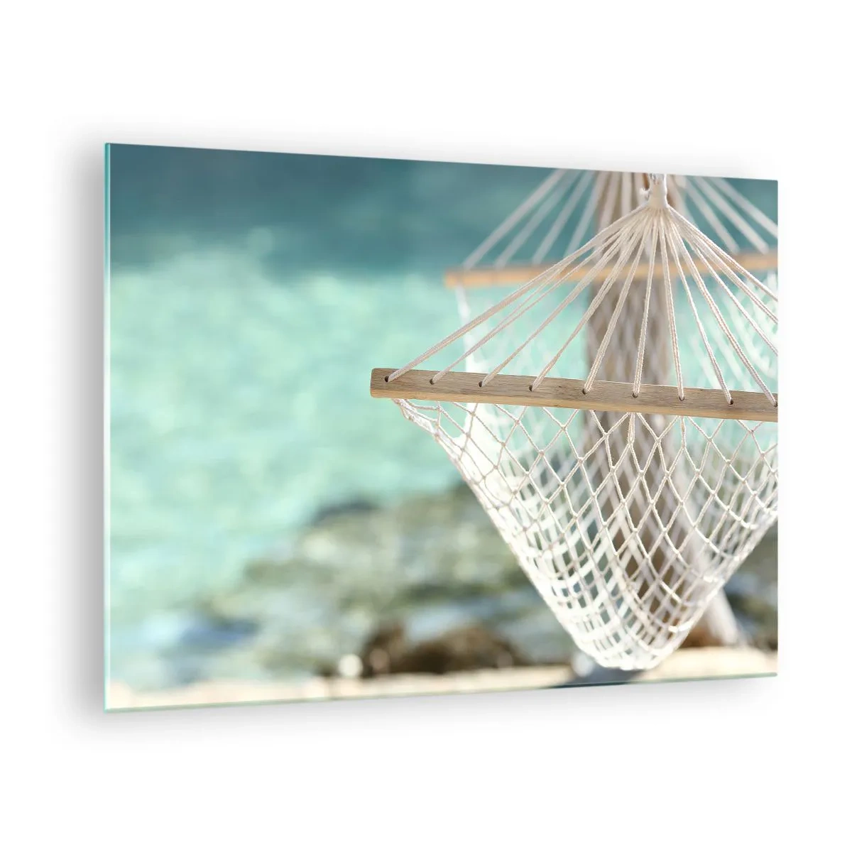 Obraz na szkle - Hamak z widokiem na krystalicznie czyste turkusowe wody - 70x50cm - Czas relaksu - Nowoczesna dekoracja ścienna do salonu i sypialni ARTTOR