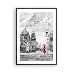 Plakat w czarnej ramie - Postać z czerwonym parasolem na tle berlińskiej architektury - 50x70cm - Berlińskie spotkanie - Nowoczesna dekoracja ścienna do salonu i sypialni ARTTOR