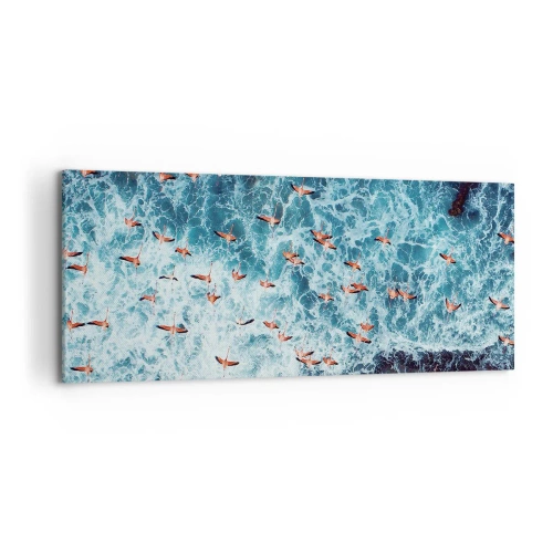Obraz na płótnie - Różowe flamingi nad błękitnym oceanem z lotu ptaka - 120x50cm - Nadmorska parada - Nowoczesna dekoracja ścienna do salonu i sypialni ARTTOR