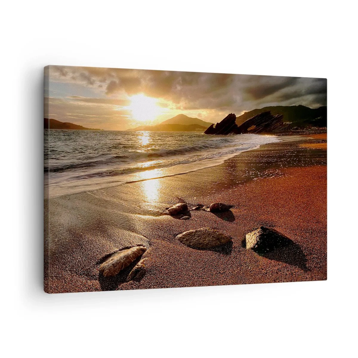 Obraz na płótnie - Plaża o zachodzie słońca z kamieniami na brzegu - 70x50cm - Idź za słońcem ku wzgórzom - Nowoczesna dekoracja ścienna do salonu i sypialni ARTTOR