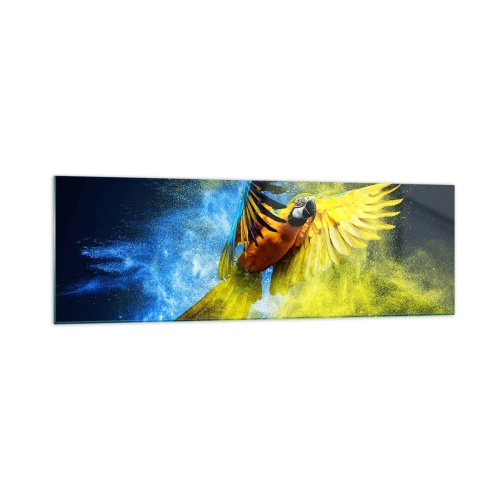 Obraz na szkle - Papuga w locie na tle kolorowych eksplozji żółtego i niebieskiego - 160x50cm - W błękitno-złotym pyle - Nowoczesna dekoracja ścienna do salonu i sypialni ARTTOR