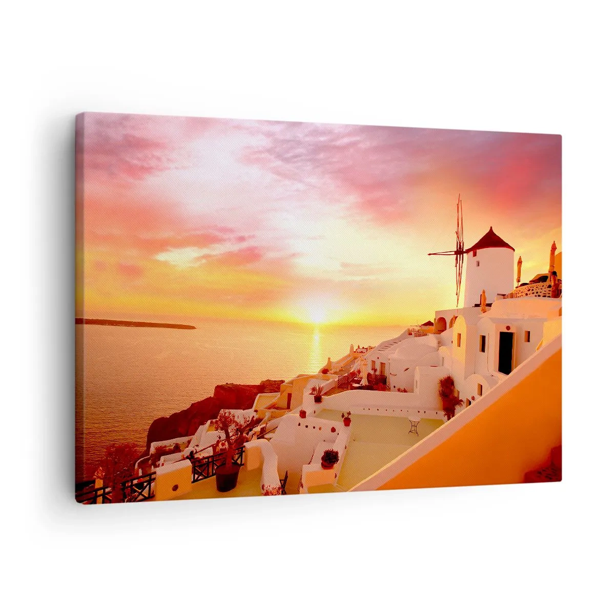 Obraz na płótnie - Santorini o zachodzie słońca z wiatrakiem - 70x50cm - Rozpłynąć się w bieli i złocie - Nowoczesna dekoracja ścienna do salonu i sypialni ARTTOR