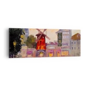 Obraz na płótnie - Czerwony wiatrak Moulin Rouge otoczony miejskim pejzażem - 140x50cm - Paryskie ikony – Moulin Rouge - Nowoczesna dekoracja ścienna do salonu i sypialni ARTTOR