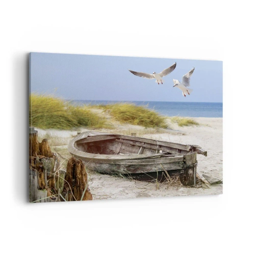 Obraz na płótnie - Porzucona łódka na plaży z mewami - 100x70cm - Skąpane wiatrem - Nowoczesna dekoracja ścienna do salonu, kuchni i sypialni ARTTOR