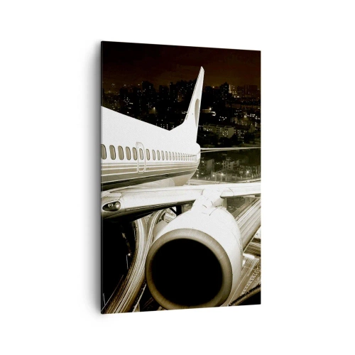 Obraz na płótnie - Samolot nad nocnym miastem z rozświetlonymi autostradami - 80x120cm - Wzlecieć w noc - Nowoczesna dekoracja ścienna do salonu i sypialni ARTTOR
