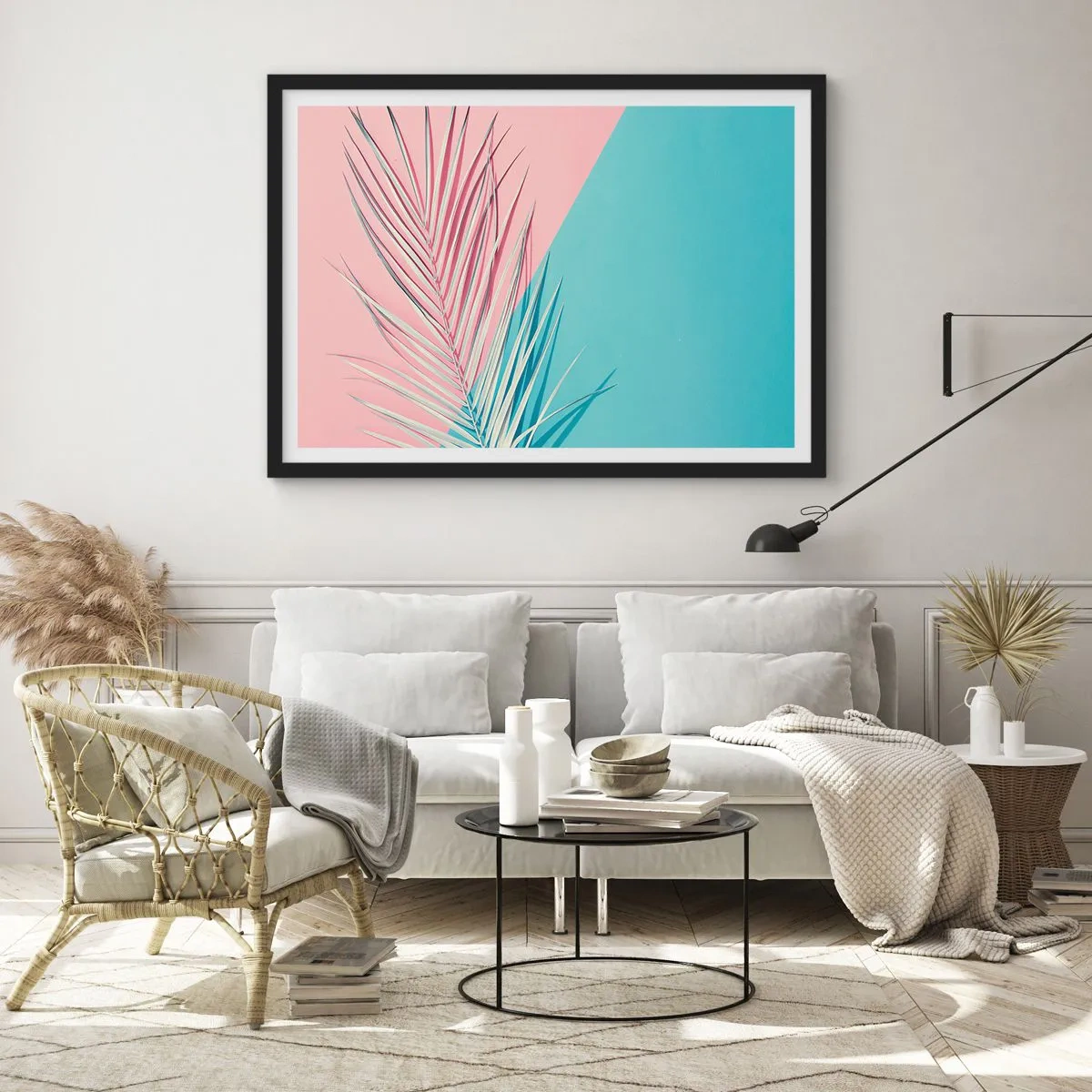 Plakat w czarnej ramie - Tropikalny liść na tle pastelowych odcieni różu i błękitu - 70x50cm - Tropikalna impresja - Nowoczesna dekoracja ścienna do salonu i sypialni ARTTOR
