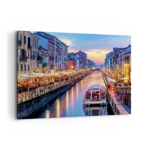 Obraz na płótnie - Kanał z oświetleniem w otoczeniu kolorowych budynków - 100x70cm - Wieczór światła i zabawy - Nowoczesna dekoracja ścienna do salonu, kuchni i sypialni ARTTOR
