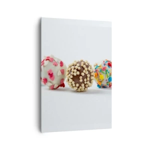 Obraz na płótnie - Kolorowe praliny z dekoracjami na białym tle - 70x100cm - Życie może być słodkie - Nowoczesna dekoracja ścienna do salonu i sypialni ARTTOR
