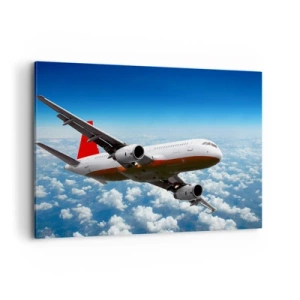 Obraz na płótnie - Samolot pasażerski lecący nad chmurami na tle błękitnego nieba. - 100x70cm - Oderwij się od tego wszystkiego - Nowoczesna dekoracja ścienna do salonu, kuchni i sypialni ARTTOR