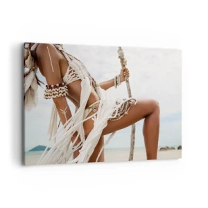 Obraz na płótnie - Postać kobiety w etnicznych ozdobach i stroju na tle tropikalnego krajobrazu - 100x70cm - Kapłanka słońca - Nowoczesna dekoracja ścienna do salonu, kuchni i sypialni ARTTOR