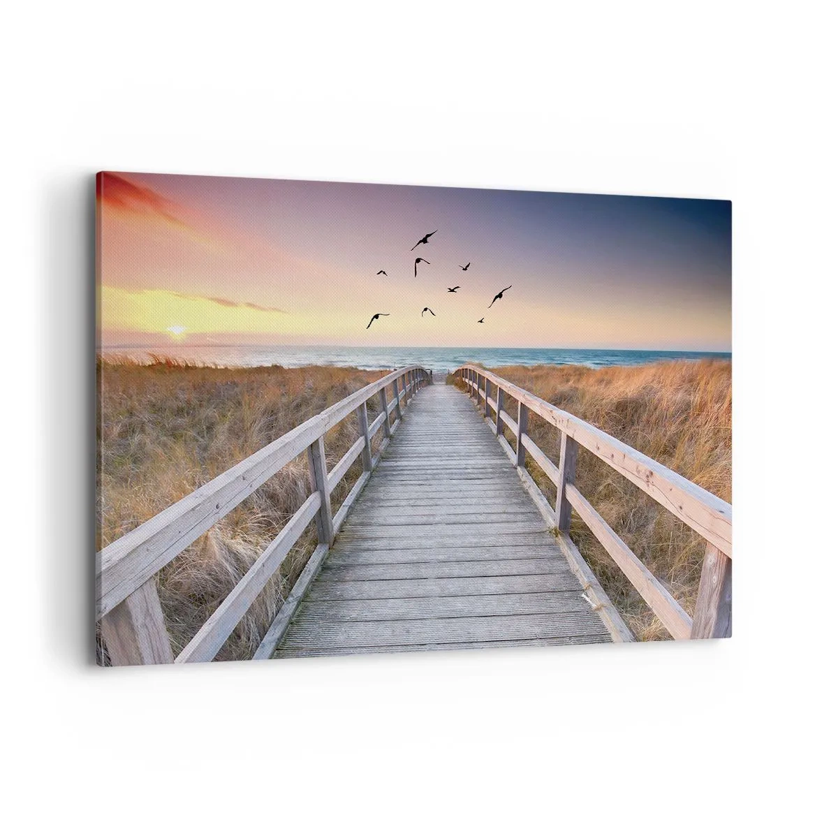 Obraz na płótnie - Drewniany pomost prowadzący na plażę o zachodzie słońca - 100x70cm - Przestrzeń wzlotów - Nowoczesna dekoracja ścienna do salonu, kuchni i sypialni ARTTOR
