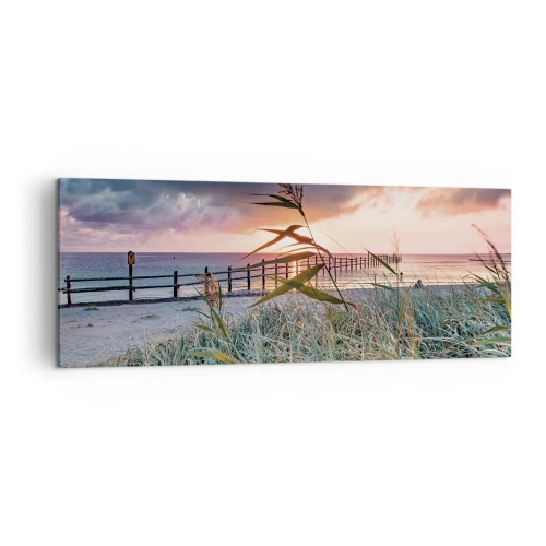 Obraz na płótnie - Plaża o zachodzie słońca z trawami na pierwszym planie - 140x50cm - Nie przemija z wiatrem - Nowoczesna dekoracja ścienna do salonu i sypialni ARTTOR