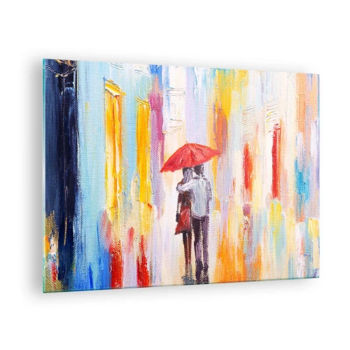 Obraz na szkle - Para trzymająca czerwony parasol w deszczu na tle kolorowej ulicy - 70x50cm - Niech pada dalej - Nowoczesna dekoracja ścienna do salonu i sypialni ARTTOR