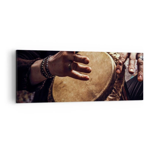 Obraz na płótnie - Ręce grające na tradycyjnym bębnie djembe - 140x50cm - W rytmie serca - Nowoczesna dekoracja ścienna do salonu i sypialni ARTTOR