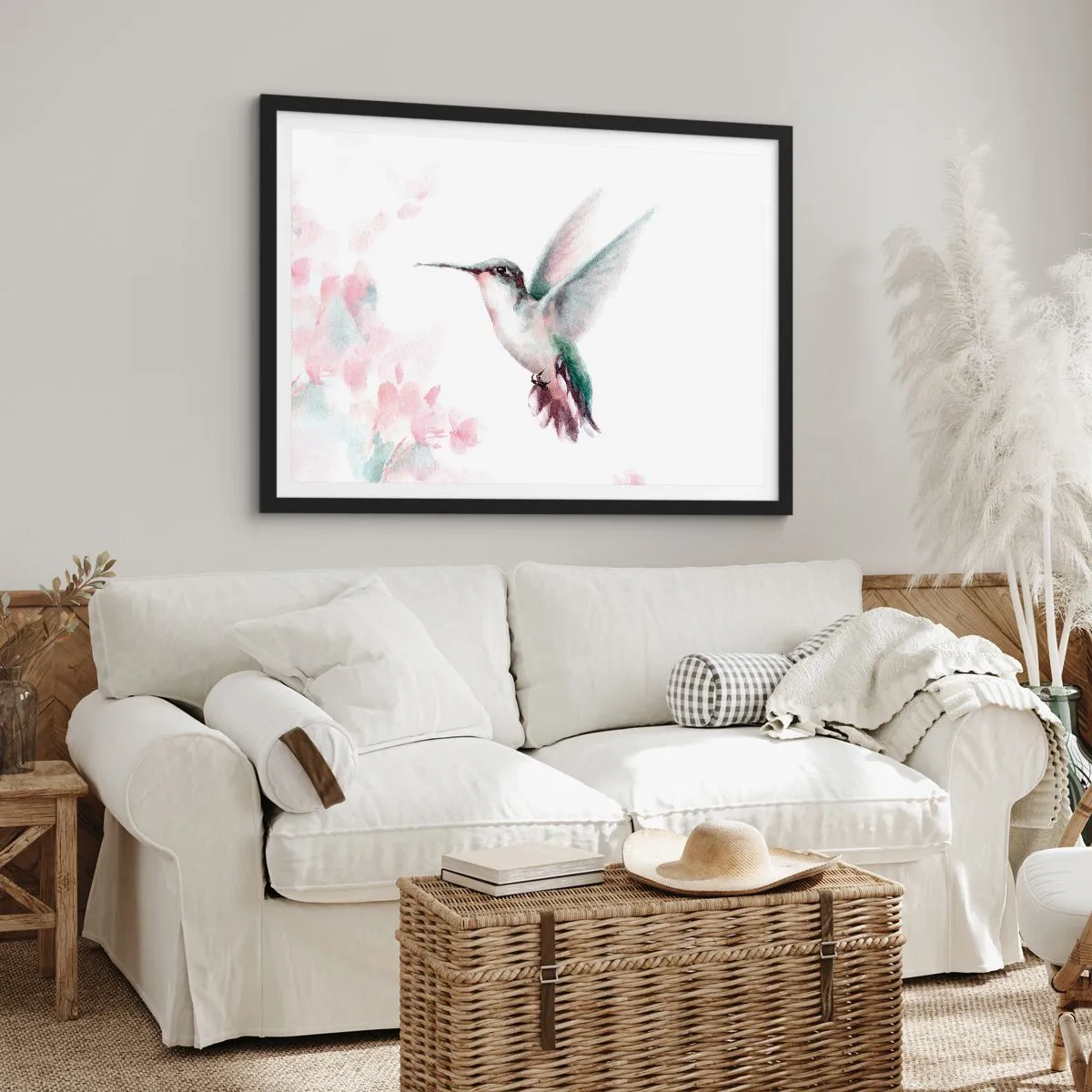 Plakat w czarnej ramie - Koliber w delikatnych pastelowych barwach na tle kwiatów - 70x50cm - Zatrzymany w trzepocie - Nowoczesna dekoracja ścienna do salonu i sypialni ARTTOR