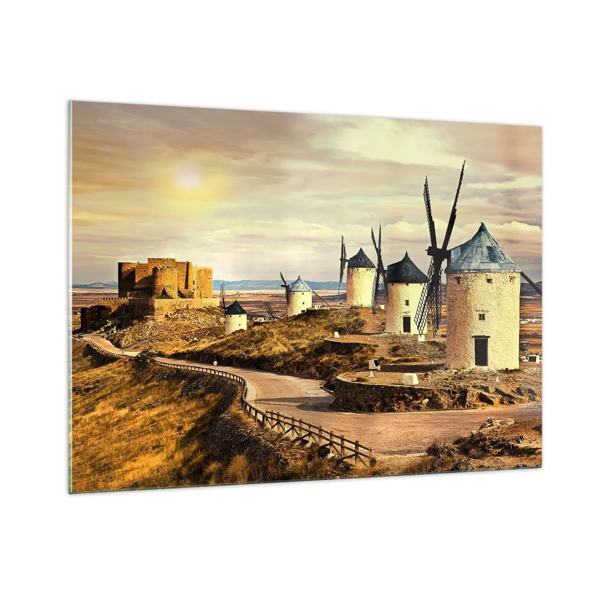 Obraz na szkle - Wiatraki i zamek w krajobrazie o zachodzie słońca - 100x70cm - Zaraz pojawi się Don Kichot - Nowoczesna dekoracja ścienna do salonu, kuchni i sypialni ARTTOR