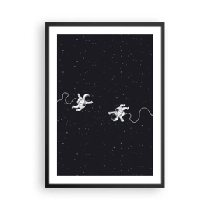 Plakat w czarnej ramie - Dwóch astronautów unoszących się w przestrzeni kosmicznej - 50x70cm - Kosmiczny pląs - Nowoczesna dekoracja ścienna do salonu i sypialni ARTTOR