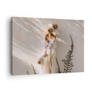 Obraz na płótnie - Kobieta w stylizacji boho oświetlona promieniami słońca - 70x50cm - Słońce i dziewczyna - Nowoczesna dekoracja ścienna do salonu i sypialni ARTTOR