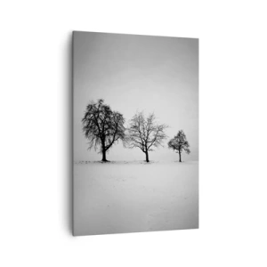 Obraz na płótnie - Trzy drzewa na zaśnieżonym polu w monochromatycznym stylu - 70x100cm - O czym śnią? - Nowoczesna dekoracja ścienna do salonu i sypialni ARTTOR