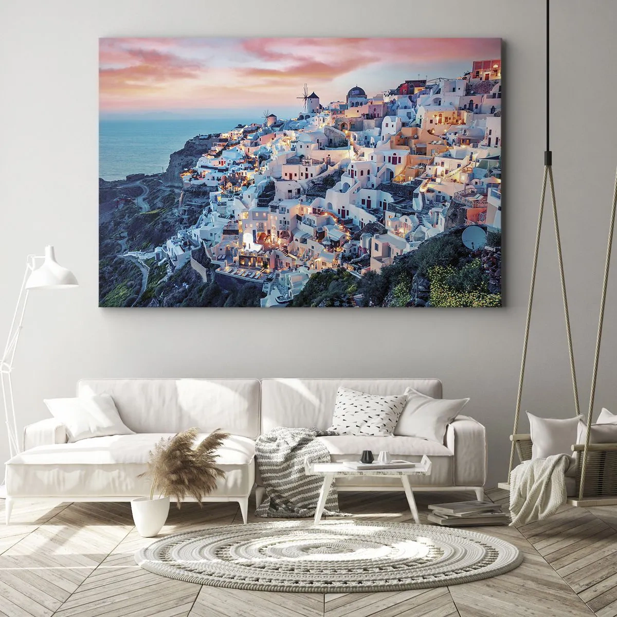 Obraz na płótnie - Santorini o zachodzie słońca z białymi budynkami na wzgórzu - 70x50cm - Twoje wielkie greckie wakacje - Nowoczesna dekoracja ścienna do salonu i sypialni ARTTOR