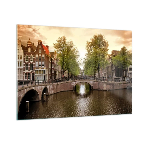 Obraz na szkle - Kanał i most w otoczeniu kamienic w Amsterdamie - 100x70cm - Łodzią czy rowerem? - Nowoczesna dekoracja ścienna do salonu, kuchni i sypialni ARTTOR