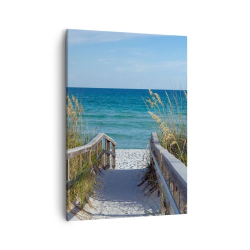 Obraz na płótnie - Drewniana ścieżka prowadząca na plażę z turkusowym morzem w tle - 50x70cm - W słońcu, na wietrze - Nowoczesna dekoracja ścienna do salonu, kuchni i sypialni ARTTOR