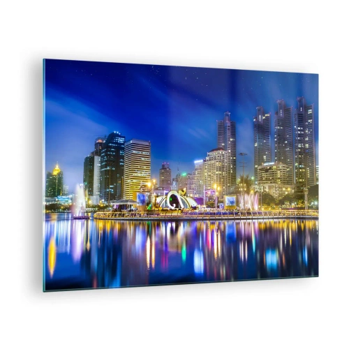 Obraz na szkle - Panorama miasta nocą z odbiciem świateł w wodzie - 70x50cm - Tęczowa noc metropolii - Nowoczesna dekoracja ścienna do salonu i sypialni ARTTOR