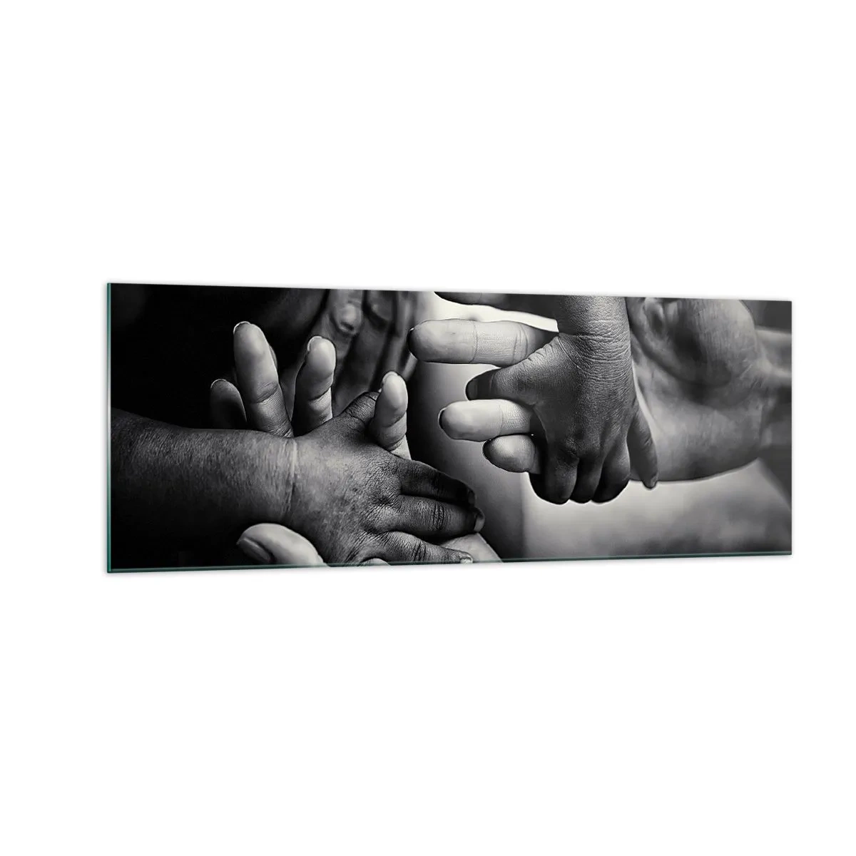 Obraz na szkle - Czarno-białe dłonie różnych pokoleń - 140x50cm - Być człowiekiem - Nowoczesna dekoracja ścienna do salonu i sypialni ARTTOR