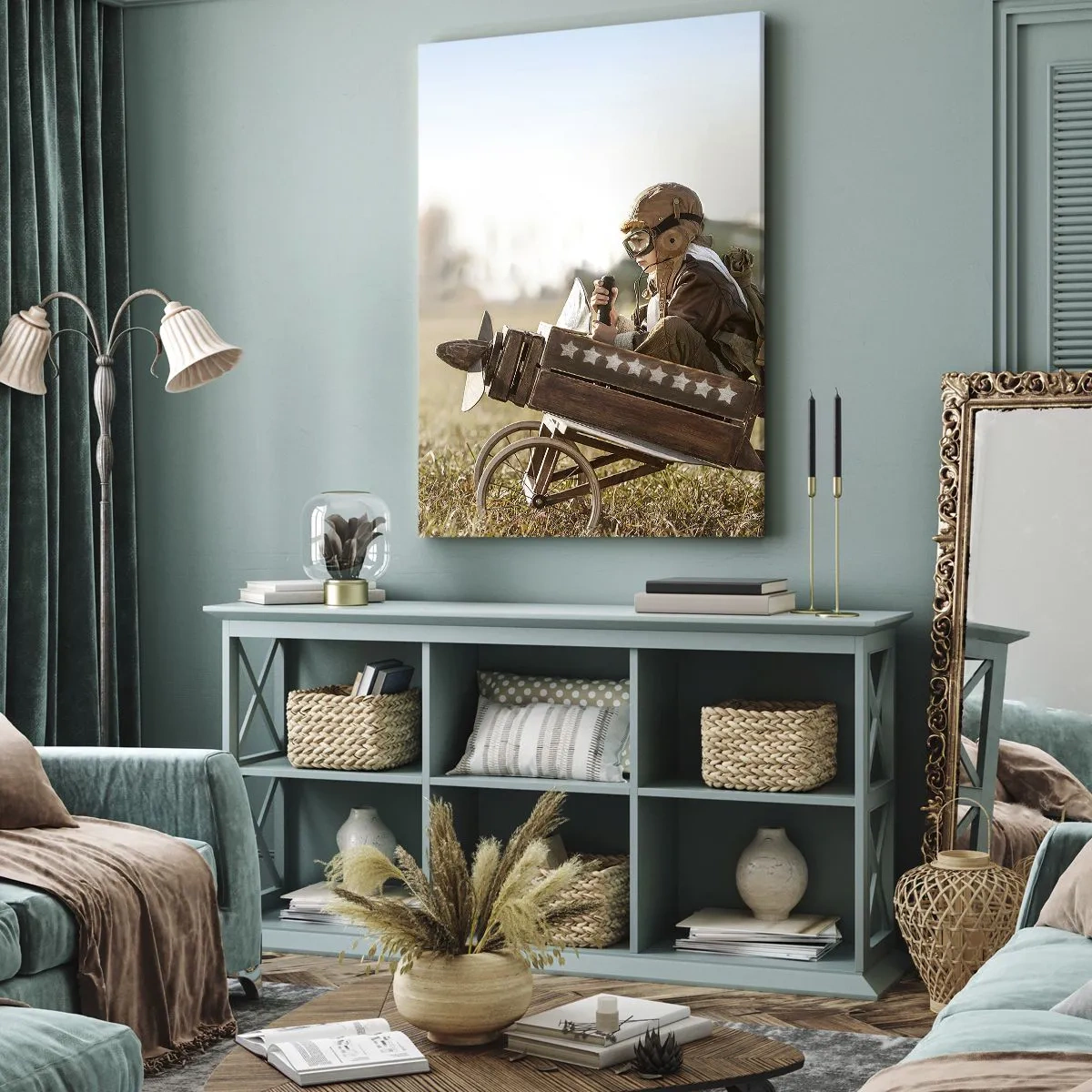 Obraz na płótnie - Dziecko w stroju pilota siedzące w drewnianym samolocie na polanie - 50x70cm - Start ku marzeniu - Nowoczesna dekoracja ścienna do salonu, kuchni i sypialni ARTTOR
