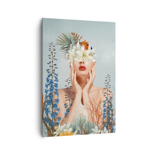 Obraz na płótnie - Portret kobiety z kwiatowym motywem na tle błękitu - 70x100cm - Kobieta – kwiat - Nowoczesna dekoracja ścienna do salonu i sypialni ARTTOR