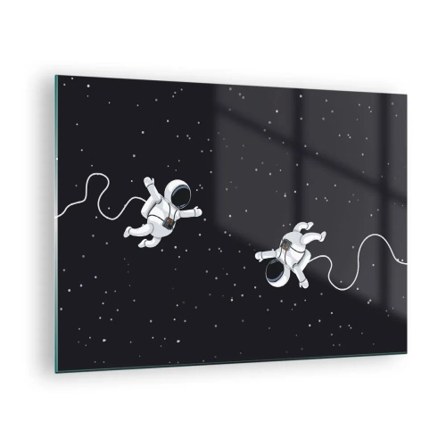 Obraz na szkle - Dwóch astronautów unoszących się w przestrzeni kosmicznej - 70x50cm - Kosmiczny pląs - Nowoczesna dekoracja ścienna do salonu i sypialni ARTTOR