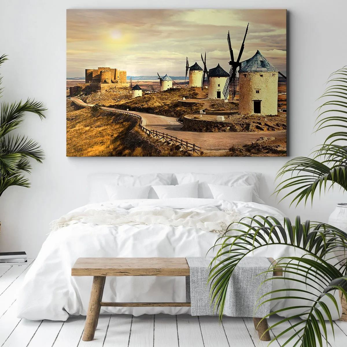 Obraz na płótnie - Wiatraki na wzgórzach z historycznym zamkiem w tle - 100x70cm - Zaraz pojawi się Don Kichot - Nowoczesna dekoracja ścienna do salonu, kuchni i sypialni ARTTOR