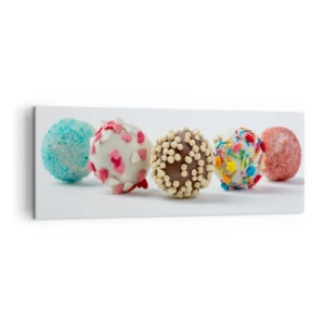 Obraz na płótnie - Kolorowe praliny z dekoracjami na białym tle - 140x50cm - Życie może być słodkie - Nowoczesna dekoracja ścienna do salonu i sypialni ARTTOR