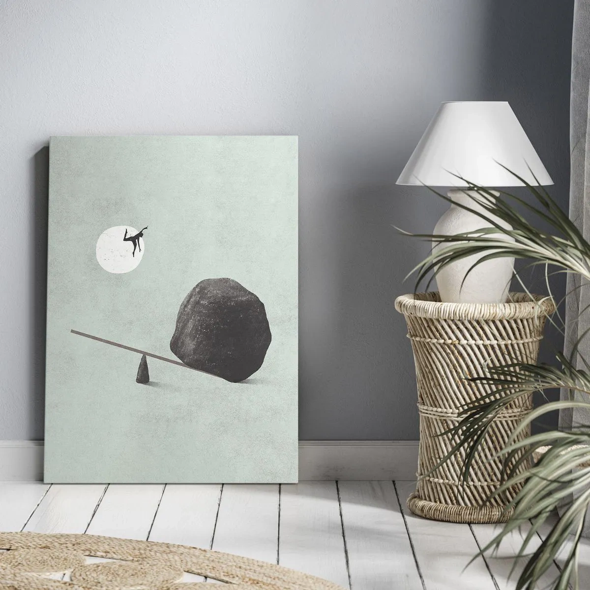 Obraz na płótnie - Sylwetka człowieka wyrzuconego w powietrze przez kamień na huśtawce - 50x70cm - Spełnione marzenie - Nowoczesna dekoracja ścienna do salonu, kuchni i sypialni ARTTOR
