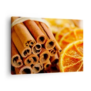 Obraz na płótnie - Laski cynamonu z suszonymi plastrami pomarańczy w ciepłych barwach - 70x50cm - Czujesz ich aromat? - Nowoczesna dekoracja ścienna do salonu i sypialni ARTTOR
