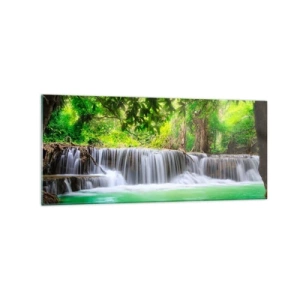 Obraz na szkle - Zielony wodospad otoczony gęstą tropikalną roślinnością - 120x50cm - Kaskada w zieleni - Nowoczesna dekoracja ścienna do salonu i sypialni ARTTOR