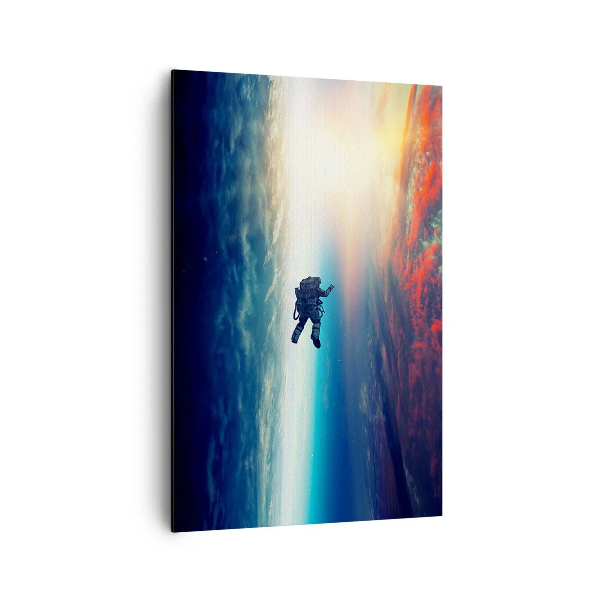 Obraz na płótnie - Astronauta unoszący się w kosmosie nad kolorową Ziemią - 80x120cm - Mierzyć się ze wszechświatem - Nowoczesna dekoracja ścienna do salonu i sypialni ARTTOR