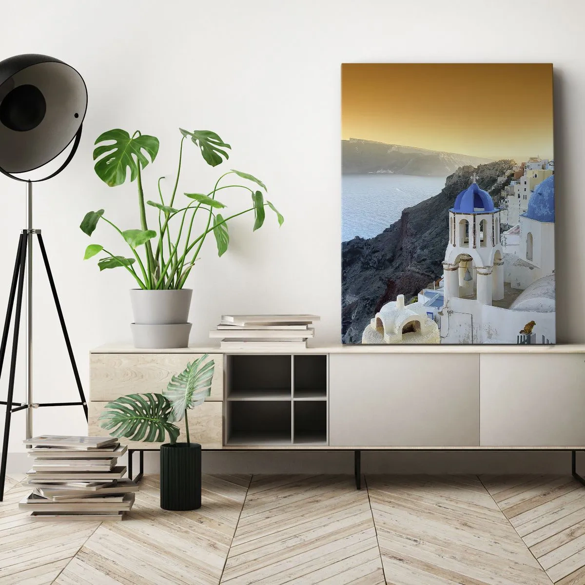 Obraz na płótnie - Widok na wioskę w Grecji z niebieskimi kopułami i morzem - 50x70cm - Santorini - przytulone do skał - Nowoczesna dekoracja ścienna do salonu, kuchni i sypialni ARTTOR