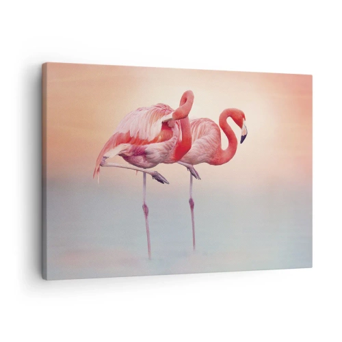 Obraz na płótnie - W kolorze zachodzącego słońca - Flamingi w delikatnych pastelowych barwach na wodnym tle - 70x50cm