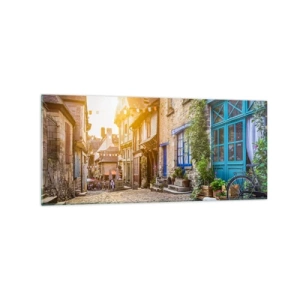 Obraz na szkle - Urokliwa uliczka z kamiennym brukiem w świetle słońca - 120x50cm - Biały duch miasteczka - Nowoczesna dekoracja ścienna do salonu i sypialni ARTTOR