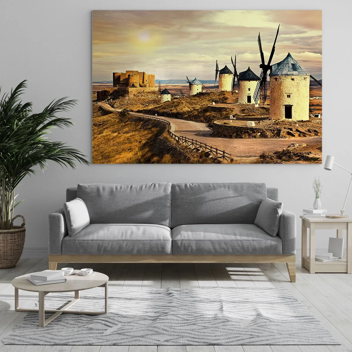 Obraz na szkle - Wiatraki i zamek w krajobrazie o zachodzie słońca - 70x50cm - Zaraz pojawi się Don Kichot - Nowoczesna dekoracja ścienna do salonu i sypialni ARTTOR