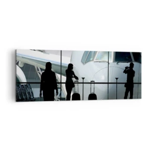 Obraz na płótnie - Lotnisko z sylwetkami ludzi i widokiem na samolot - 140x50cm - Vis a vis na lotnisku - Nowoczesna dekoracja ścienna do salonu i sypialni ARTTOR