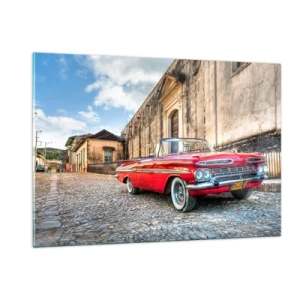 Obraz na szkle - Klasyczny czerwony kabriolet na brukowanej ulicy w scenerii retro - 120x80cm - Kubańskie wzruszenia - Nowoczesna dekoracja ścienna do salonu, kuchni i sypialni ARTTOR