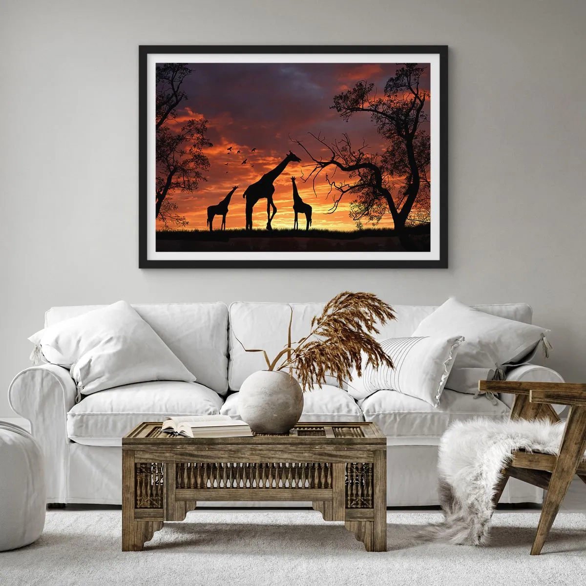 Plakat w czarnej ramie - Sylwetki żyraf na tle zachodzącego słońca w Afryce - 100x70cm - Mała kolacja w gronie najbliższych - Nowoczesna dekoracja ścienna do salonu i sypialni ARTTOR