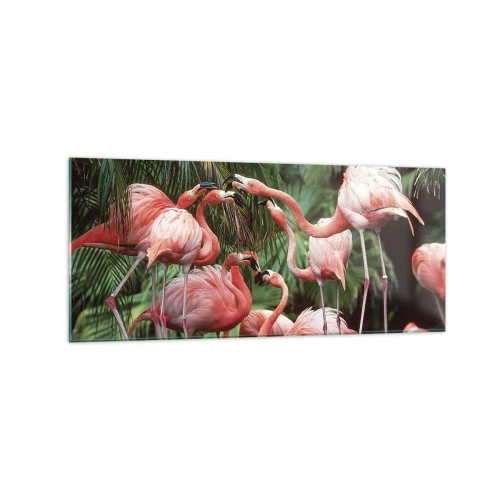 Obraz na szkle - Grupa flamingów w tropikalnym otoczeniu palm - 120x50cm - Popołudniowe ploteczki - Nowoczesna dekoracja ścienna do salonu i sypialni ARTTOR