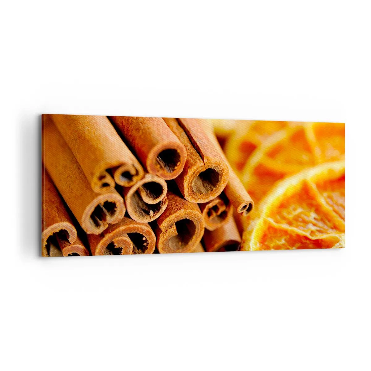 Obraz na płótnie - Laski cynamonu z suszonymi plastrami pomarańczy w ciepłych barwach - 120x50cm - Czujesz ich aromat? - Nowoczesna dekoracja ścienna do salonu i sypialni ARTTOR