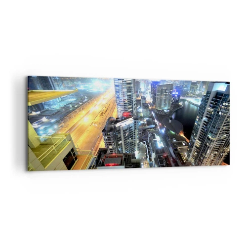 Obraz na płótnie - Panorama nocnego miasta z oświetlonymi drapaczami chmur - 120x50cm - Cud na pustyni - Nowoczesna dekoracja ścienna do salonu i sypialni ARTTOR